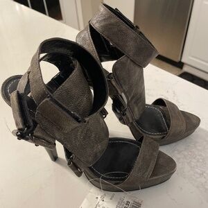 42. Report signature Randolph 2 size 7.5 gladiator heels